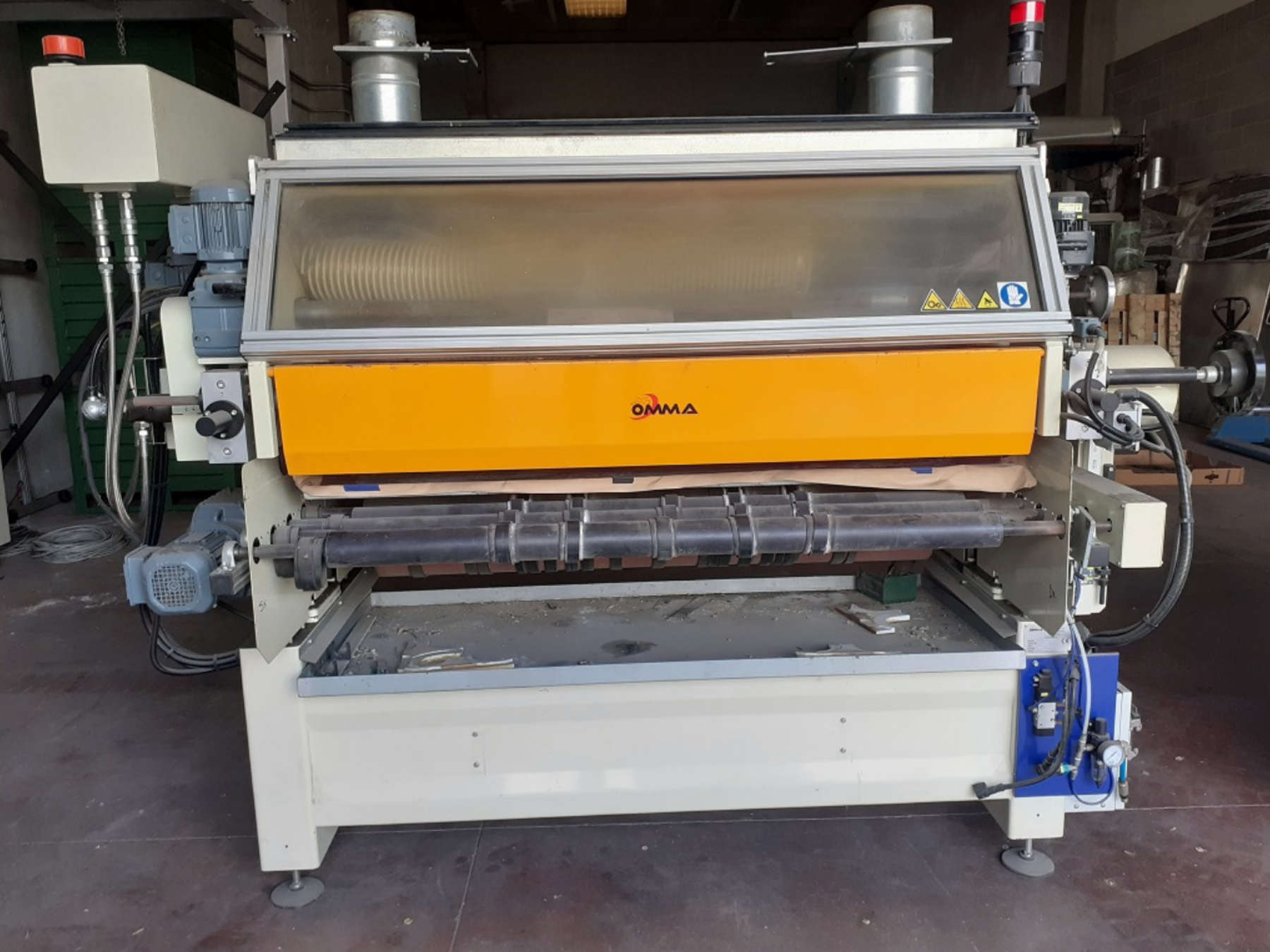 Sistema incollaggio HOT MELT PUR superiore Su questa macchina industriale